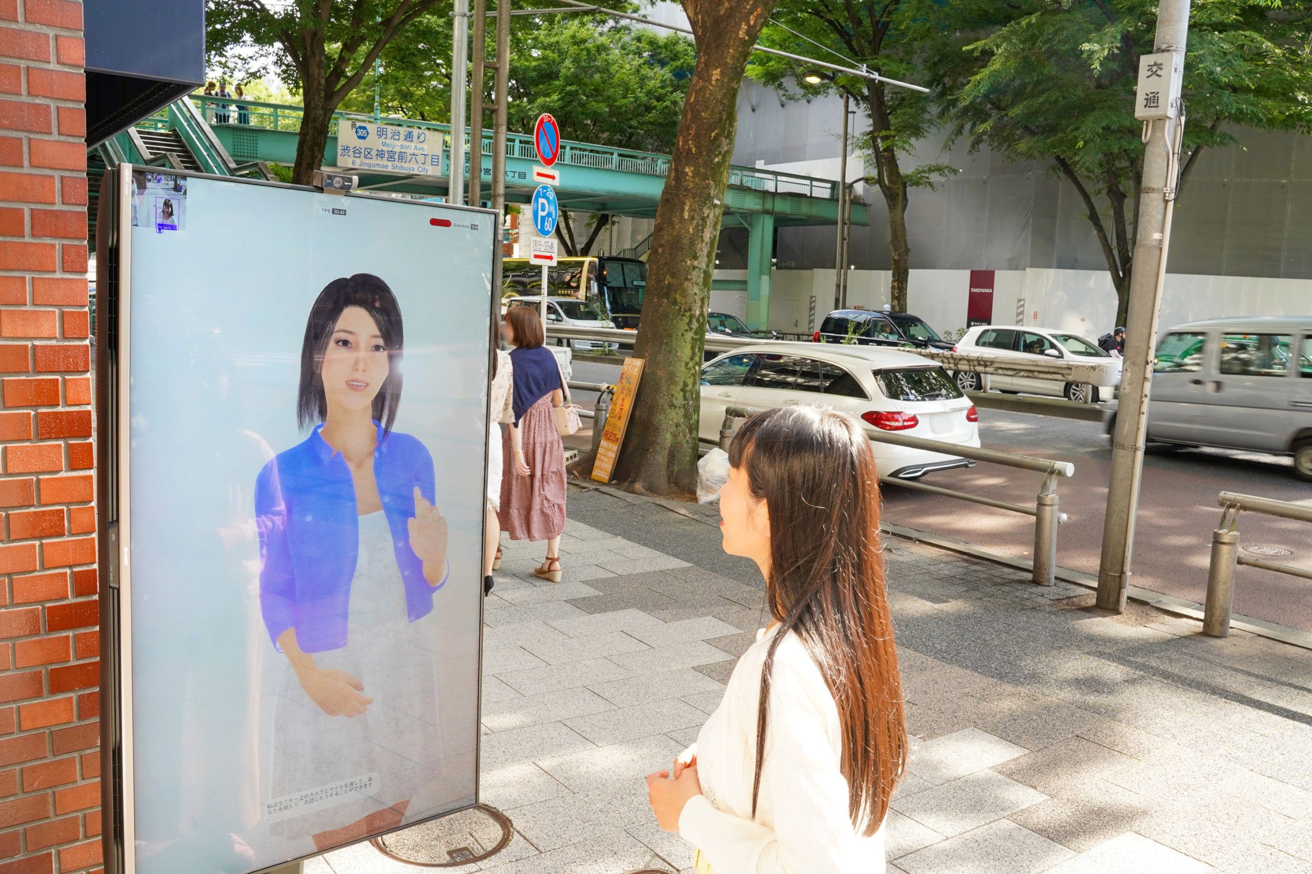 Couger develops Human-like AI assistant that communicates like a human. Testing its potential as a next-generation interface on digital signage around train stations.